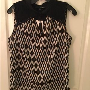NWT black and white blouse with lace detail.